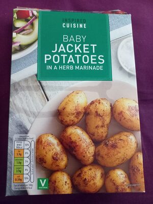 Baby jacket potatoes in herb marinade